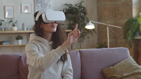 Woman-in-VR-Headset-Using-Invisible-Touchscreen